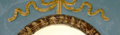 Cornice ovale in stucco decorato a finto marmo